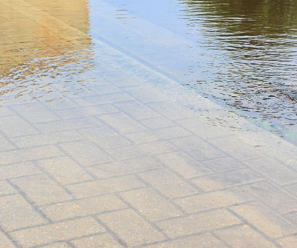 Pavers And Flooded Water